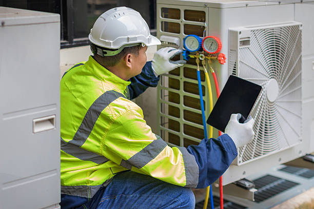 Professional Heat Pump Repair technician working in Mount Eden, KY